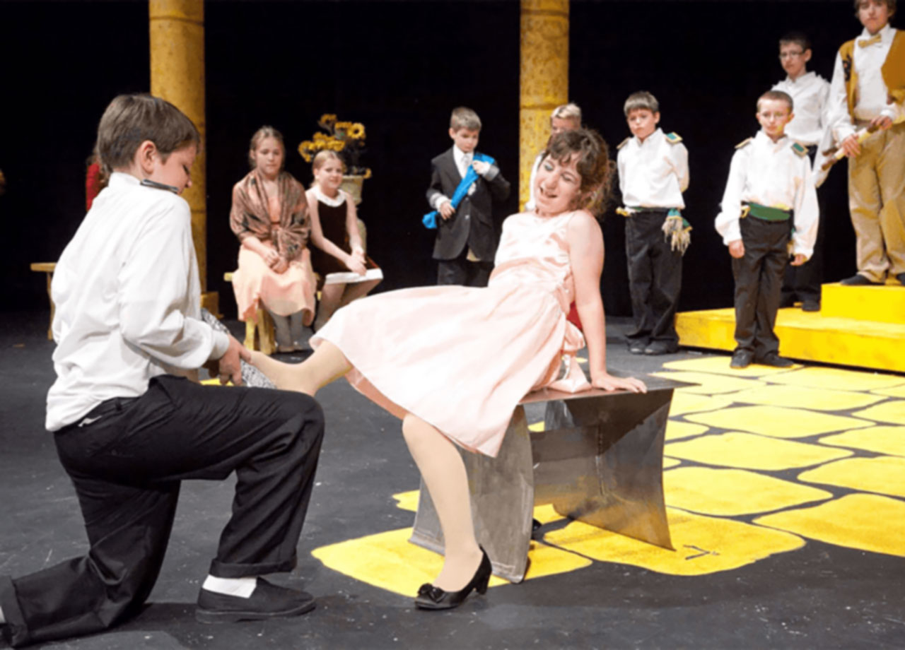 Students on stage during Cindarella performance.