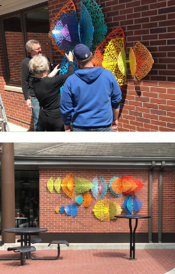 Wall installation of a sculpture.