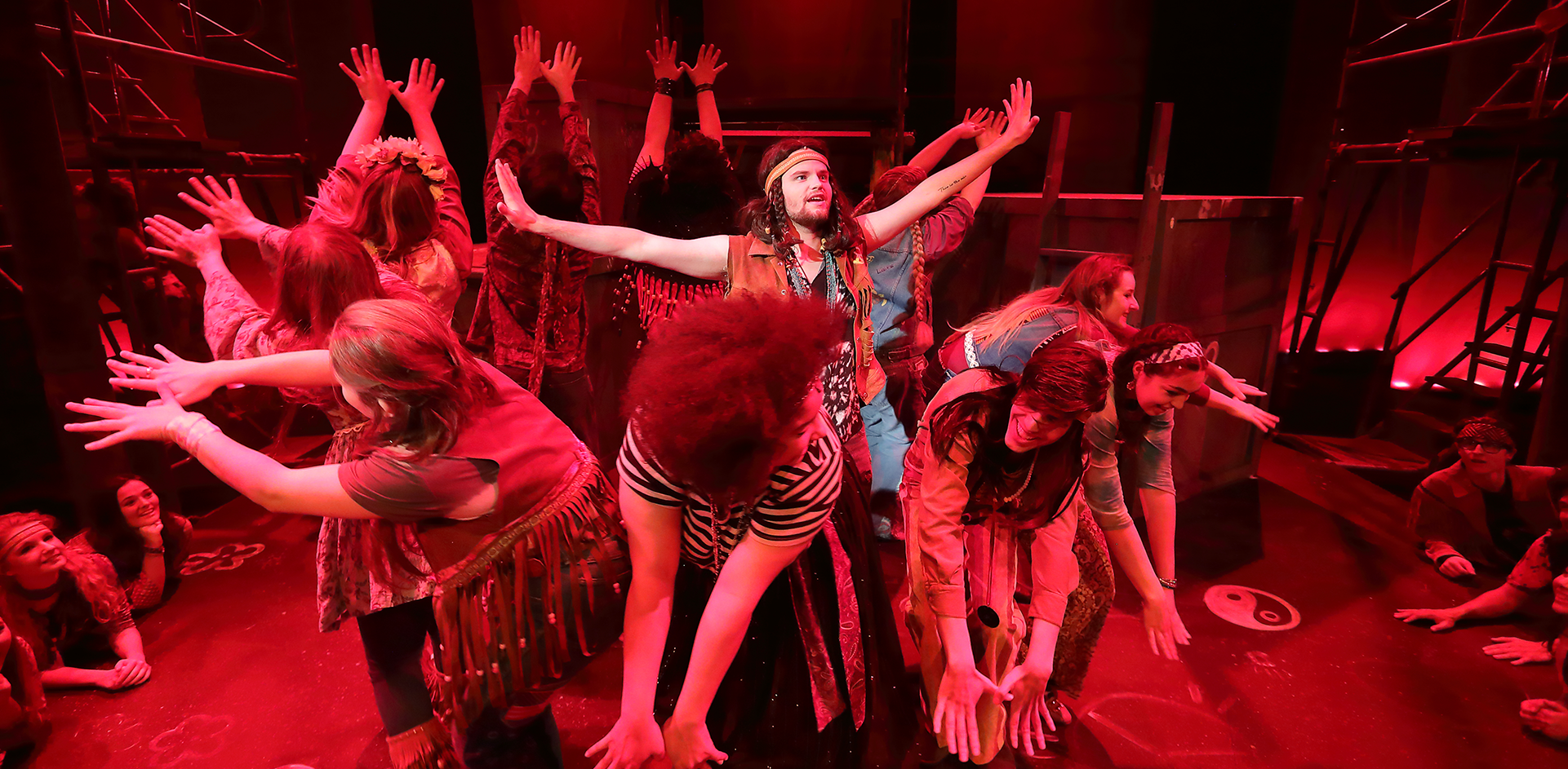 theatre students performing HAIR 