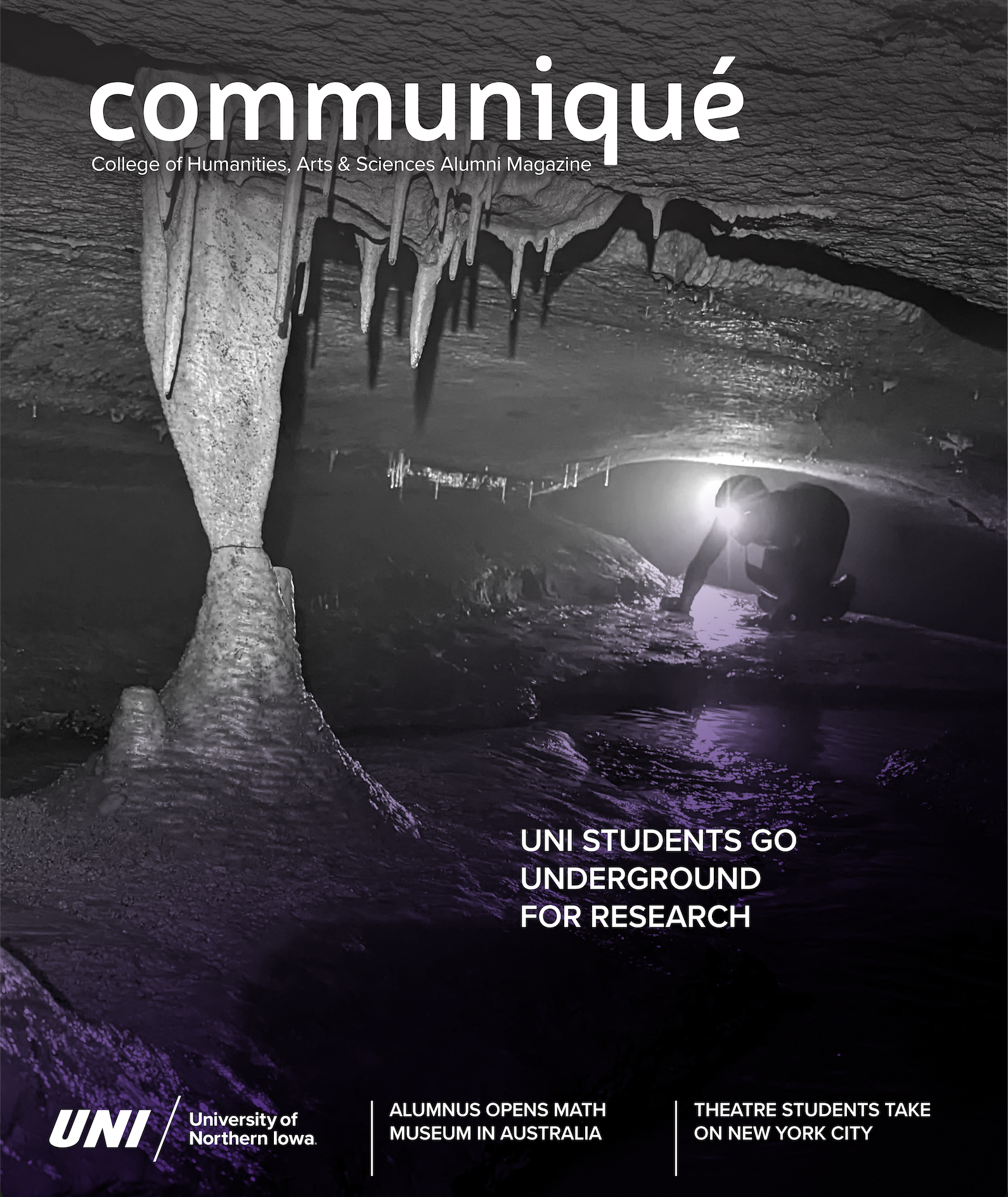 cover of magazine showing student in a cave