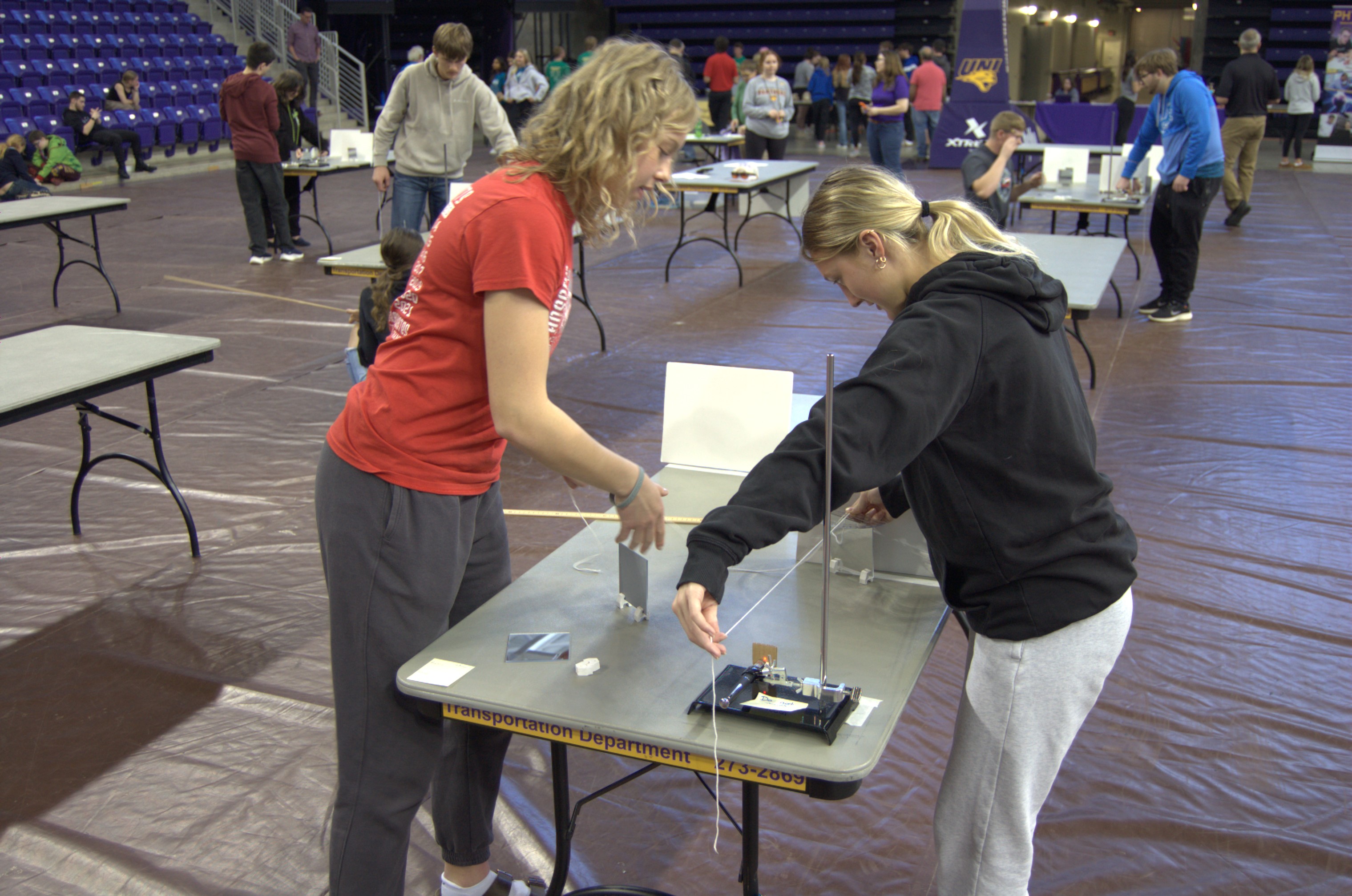 Students working on an event at the 2024 Physics Competition.