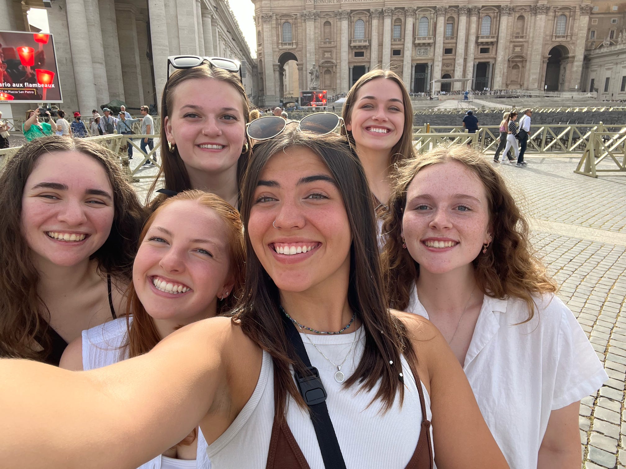 selfie of six smiling UNI students 