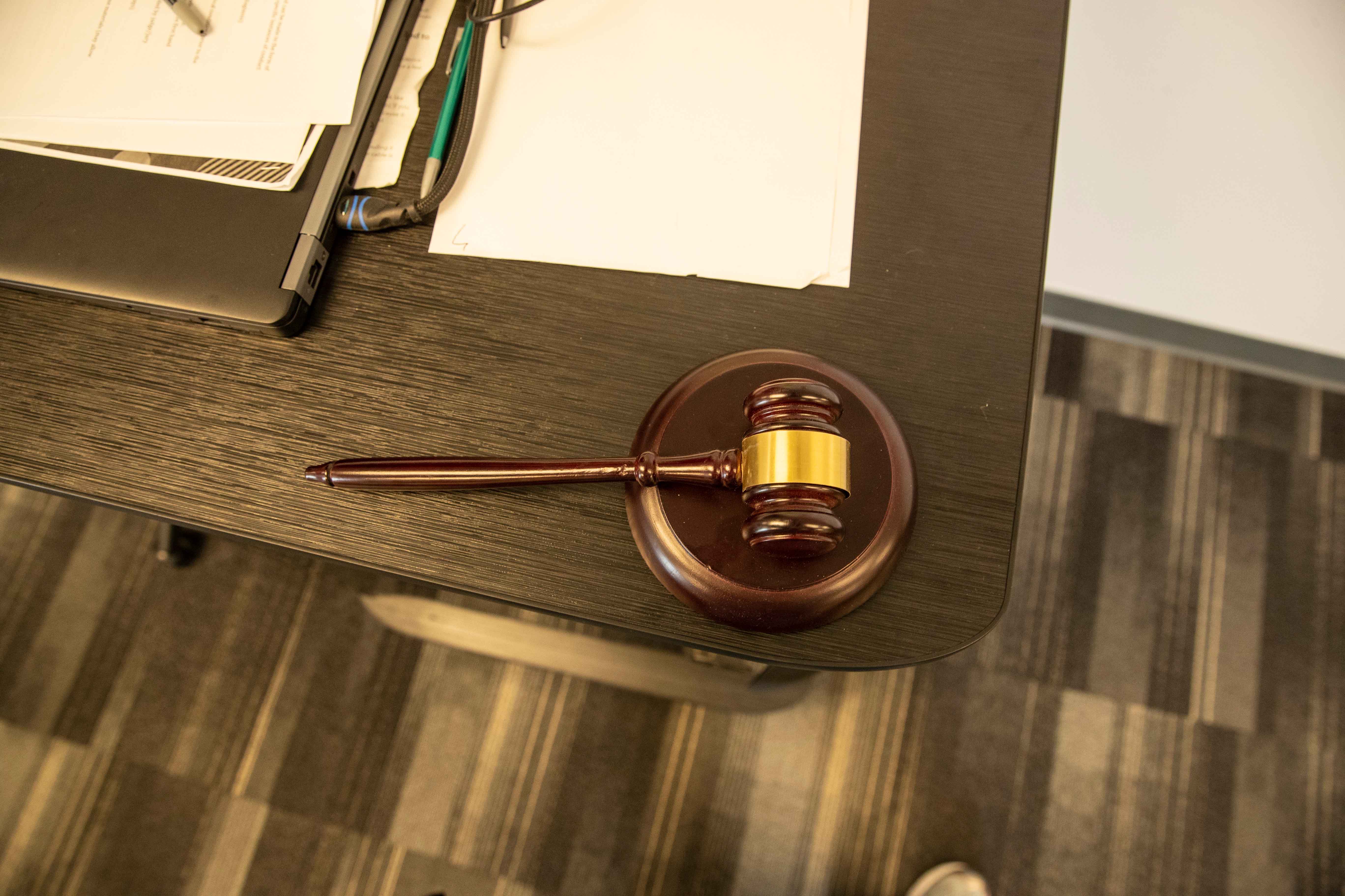 Gavel sitting on a table.