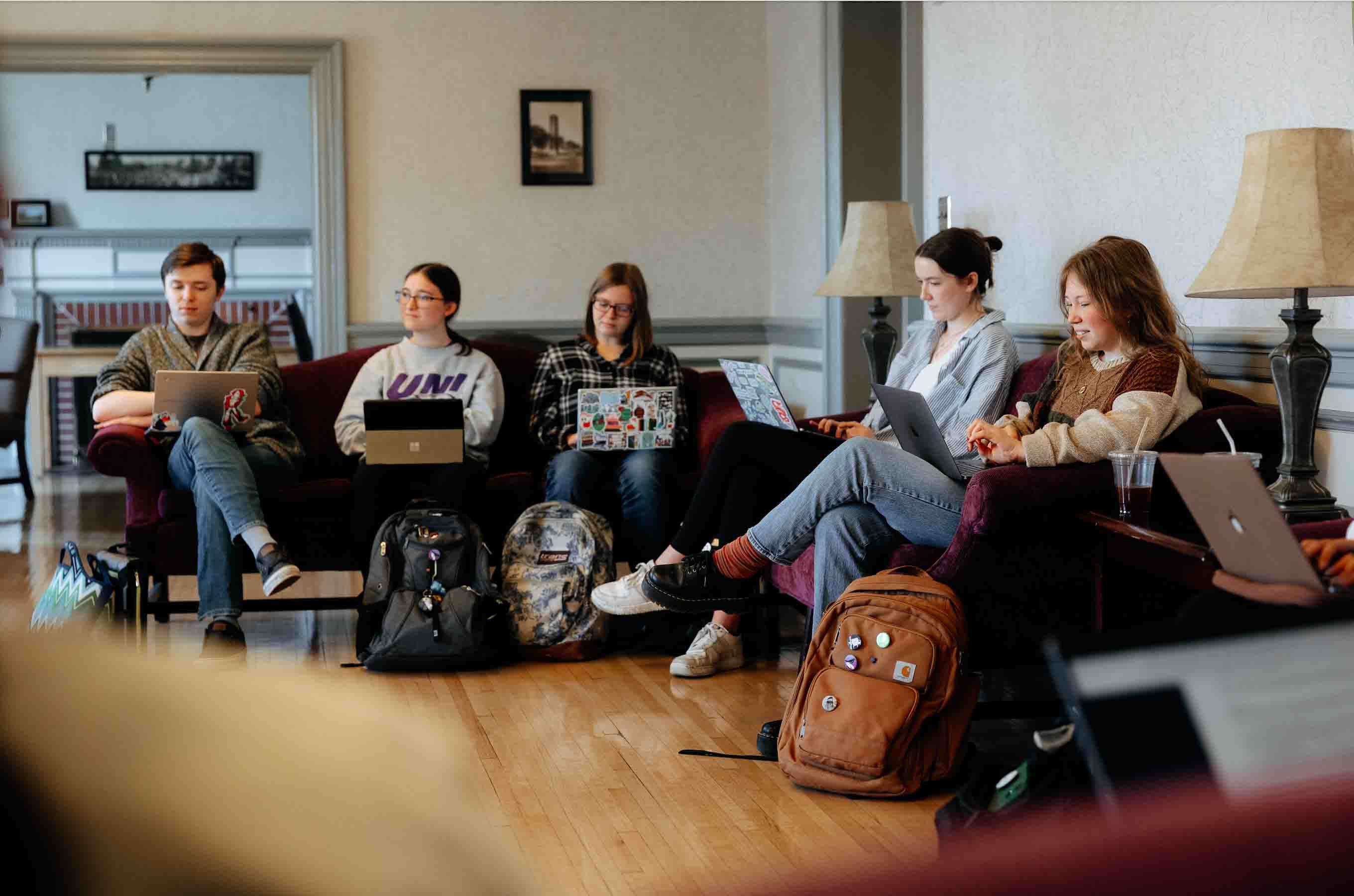 Students studying in a lounge area