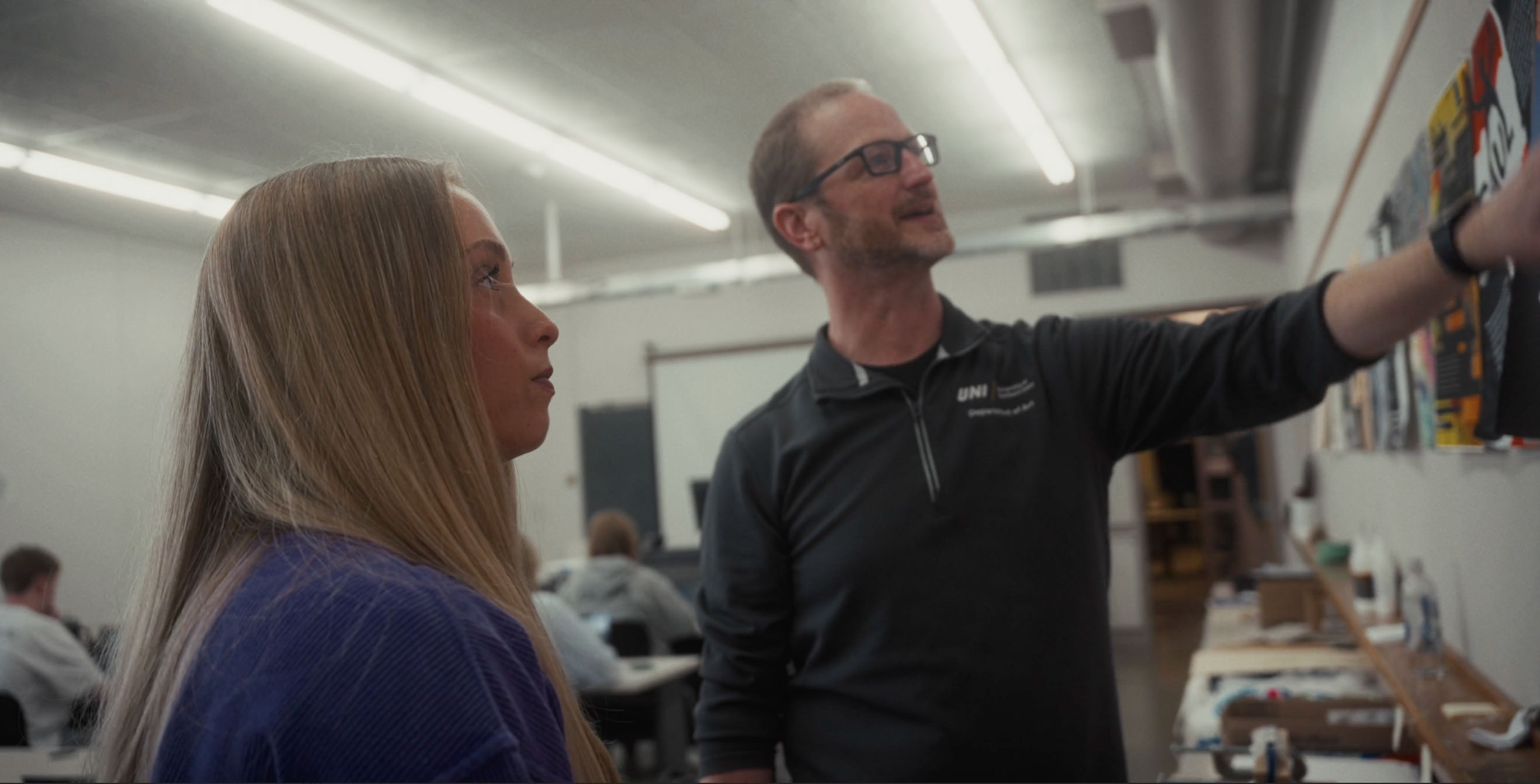 Graphic Design Student With Professor