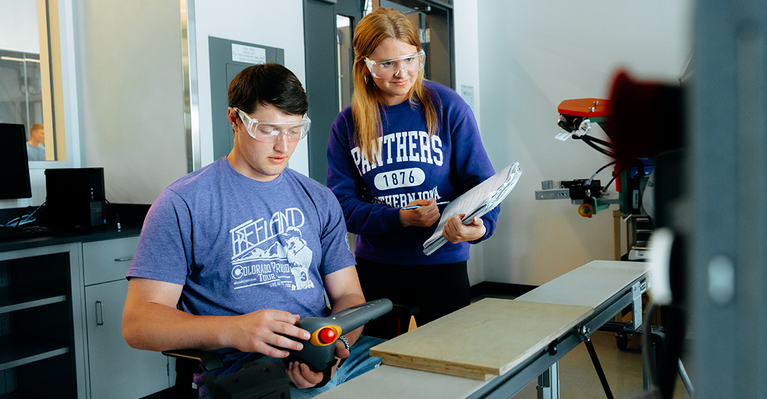 engineering students in a lab