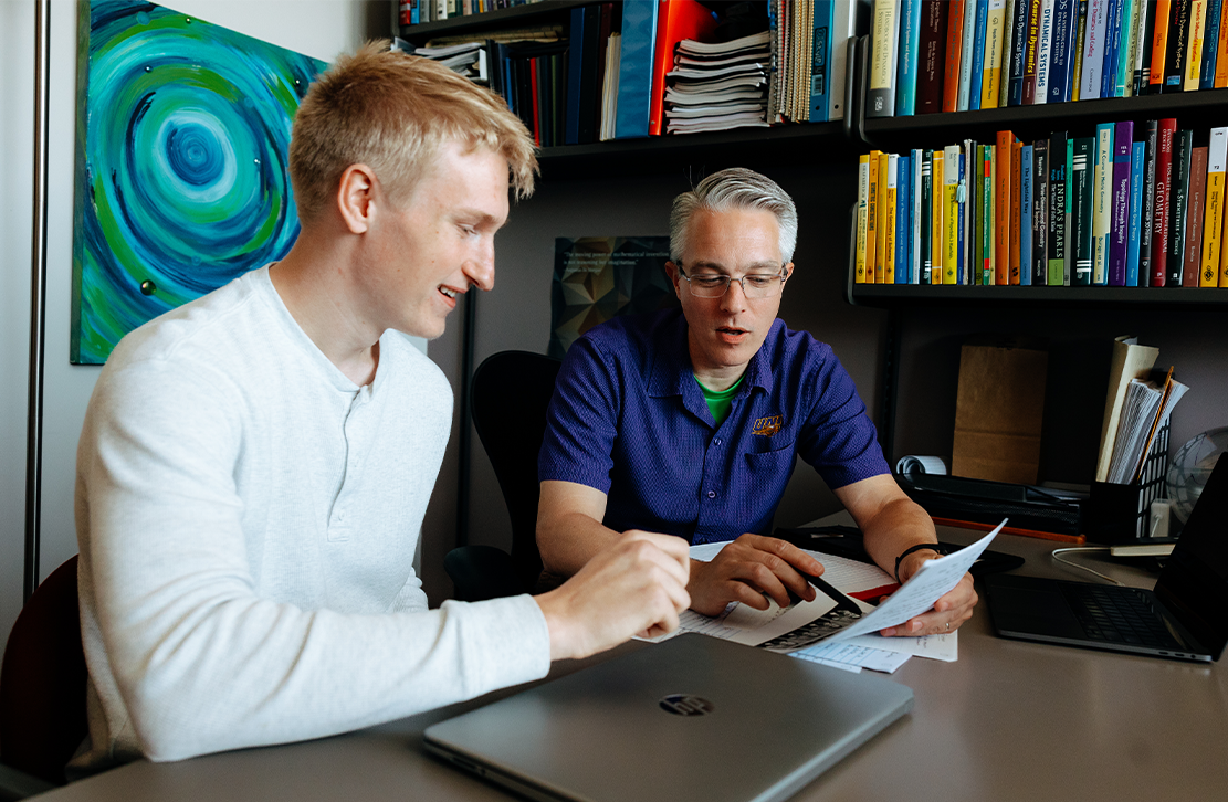 student and faculty working on undergraduate research 