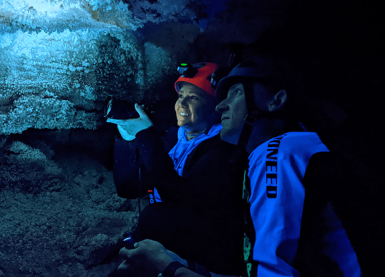 Students inside a cave.
