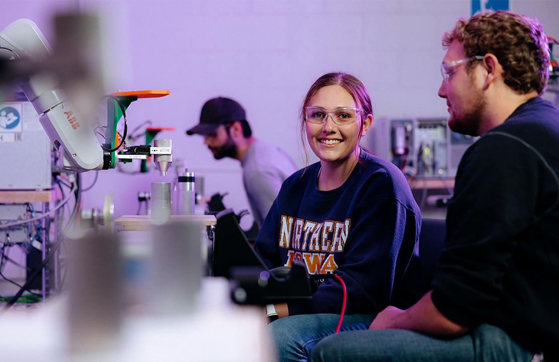 mechanical engineering students in a lab