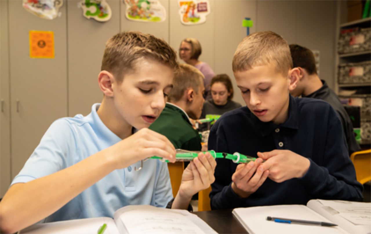 Children working on an experiment.