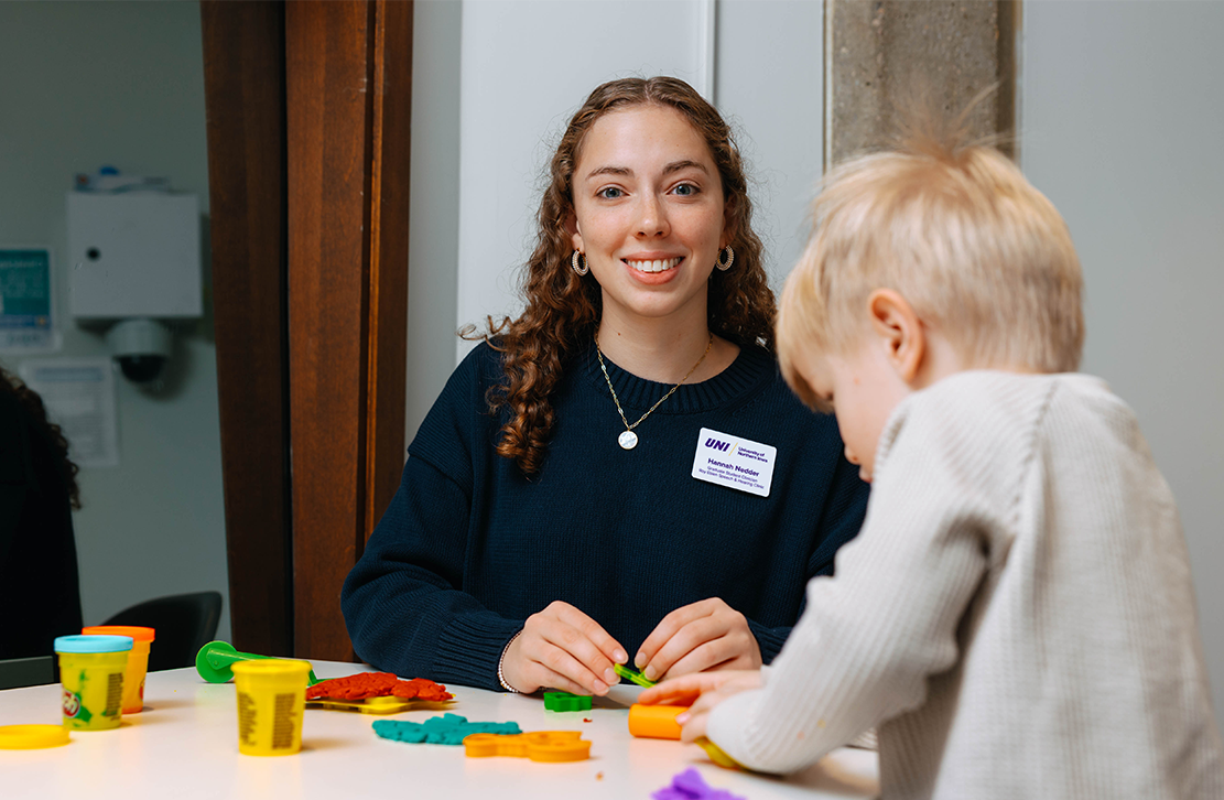 student working with a child client 