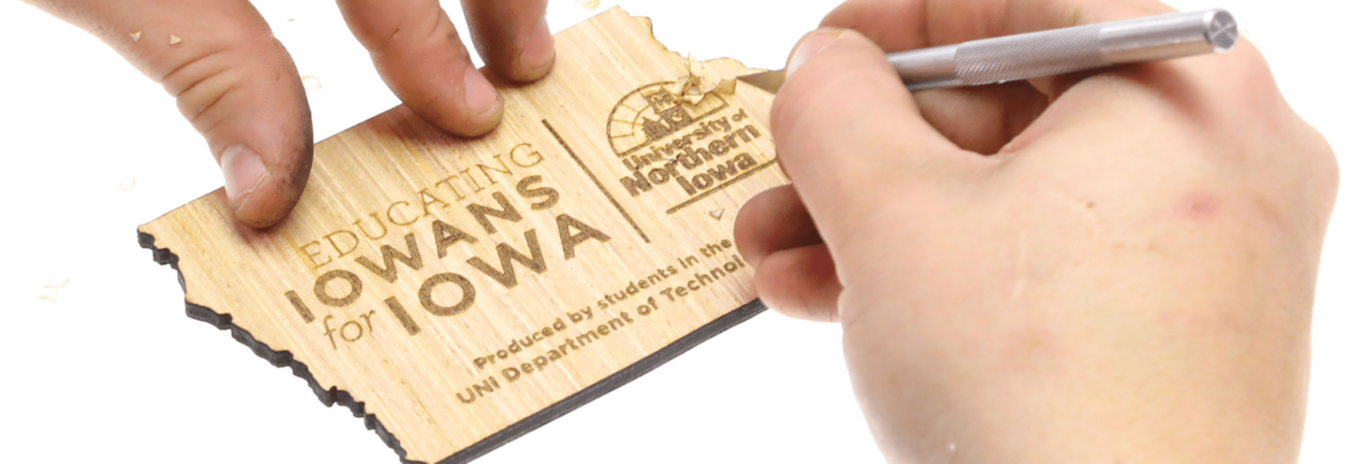 Educating Iowans engraving.